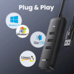 Hub USB-A 3.0 Ugreen 10915 4 Puertos USB-A 3.0 (5Gbps), Cable 25Cm, Indicador LED, Entrada USB-C Para Alimentar Equipos De Mayor Consumo, Color Negro